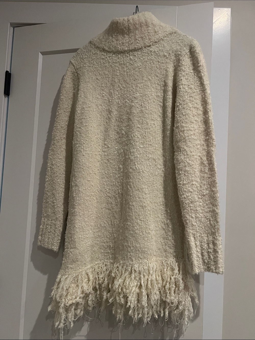 Cozy Cream Bouclé Turtleneck Sweater Dress with Fringe